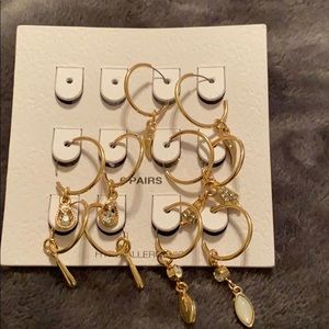 5 pairs of circle hoops with charms